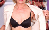 Anilos Susan Lee 23084 Lonely naked mature housewife Susan Lee comforts herself by fingering her Anilos pussy on the sofa