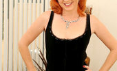 Anilos Sasha Brand 23175 Nude Anilos cougar Sasha Brand eases her sex cravings with her glass sex toy