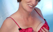 Anilos Ray Lynn 23283 Naked Anilos grandma stuffs her mature pussy with the rabbit vibrator