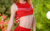 Twistys Heather Carolin 28726 Heather Carolin in a cheerleader outfit stripping.
