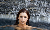 Penthouse Jayden Cole 37108 Jayden Cole is a vision as she dramatically emerges from beneath the pool's surface, sparkling water running down the length of her naked body and her wet red hair running in ringlets over her quivering breasts!
