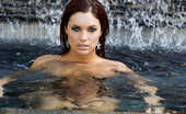 Penthouse Jayden Cole 37108 Jayden Cole is a vision as she dramatically emerges from beneath the pool's surface, sparkling water running down the length of her naked body and her wet red hair running in ringlets over her quivering breasts!
