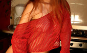 Met Art Viki A Purpurea by Chepurnoy 38237 Serious looking model has fire red hair, lips is burning hot.
