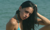 Met Art Selene A Live On Met by Met Cam Models 38474 Small model Selene on the beach as she removes her bikini.
