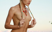 Met Art Liza B Eternia by Voronin 38552 Silky blonde with pigtails and a toned body on vacation.
