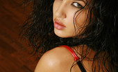 Met Art Olga M Tiarixa by Voronin Hot dark haired model with cat like sexiness wearing appropriate red and black.

