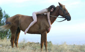 Met Art Dariya A Avans by Goncharov 38652 Riding in a strong horse is this brunette with kinky hair and alabaster skin.
