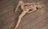 Met Art Ada A Stilius by Max Asolo 39281 Ada�s body art  is in all the right places on her soft blonde frame.
