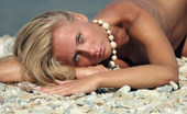 Met Art Volna A Sunshine by Alan Anar 39328 Surfer girl Volna exposes her lean and tanned body out at the beach.

