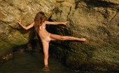 Met Art Petra E Akian by Michael Maker 39401 Petra gets wet and goes caving in this outdoor shoot.
