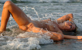 Met Art Mira A Presenting Mira by Goncharov 39471 Long haired blonde gets down and dirty in the sand in the mud and sun.
