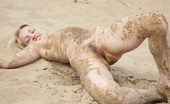 Met Art Olya N Nudita by Zesleder 40077 Messy movie of this young girl playing outside nude in the mud.
