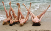Met Art Adriana E & Milana B & Uma B & Yara A Mar Nero by Goncharov 40485 Four girls play on the beach and let the ocean caress their wonderful nakedness.
