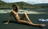 Met Art Betty A Perous by Magoo 40735 Burning hot curly blonde plays in black sand out with nothing on.
