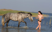 Met Art Olga K Riding by Goncharov 40921 Horses and naked girls going bare back and getting wet and a red asses.

