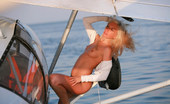 Met Art Alicia B Exotika by Rigin 41000 Blonde girl who loves to be naked and loves to fly planes should get both.
