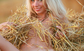 Met Art Natalia B Hellika by Rigin 41369 Country blonde with blue eyes and a heart the size of Texas gets down and dirty in the hay, and naked as a J bird.
