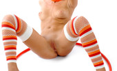 Met Art Ashley A Rings by Ingret 43002 Hula Hoop in hand and twirling around her naked body as she teases us fully.
