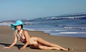 Met Art Adele B Valovi by Tony Murano 44477 Smoldering blonde enjoying the sun and the sea by herself.

