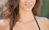 Met Art Malena Morgan Amartia by Jason Self 44987 Malena does a poolside striptease in her black and blue two-piece.
