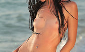 Met Art Daloria A Vasilema by Peter Guzman 45018 Daloria strips off her white bikini for a refreshing skinny dip by the beach.
