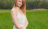 Met Art Anett A Presenting Anett by Stepanov 46266 Anett A evokes a sweet and young maiden, her petite body all over the lush green grass as she spends an idyllic and carefree day under the sun.
