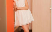 Met Art Bansari A Risveglio by Karl Sirmi 46403 Delicate facial features, innocent gaze, and petite, nubile body, Bansari strips her cute white dress and poses sensually inside the bedroom.

