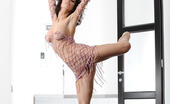 Met Art Elsa A Ciseaux by Goncharov 46515 Elsa makes a gorgeous series in pink   fishnet top while she dances gracefully   like a ballerina that shows off her   stunning flexible body, long sexy legs   and especially her round perky butt.
