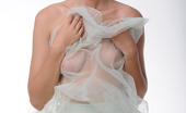 Met Art Rachel Blau Suwerte by Goncharov 46574 Rachel enjoys flaunting her fine luscious body with a white frilly shawl, especially her round, luscious breasts with puffy nipples, in a studio photo-shoot.
