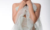 Met Art Rachel Blau Suwerte by Goncharov 46574 Rachel enjoys flaunting her fine luscious body with a white frilly shawl, especially her round, luscious breasts with puffy nipples, in a studio photo-shoot.
