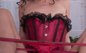 Met Art Verona A Eorum by Matt Hathaway 46804 Black hair, sultry face, and body that looks stunning in red corset, matching panty, and black stiletto shoes.
