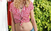 Met Art Zemira A Wovelin by Leonardo 46810 Wearing a red plaid shirt, tattered denim shorts, and cute pigtails, Zemira A exudes the carefree beauty of a playful teen with the cute girl-next-door allure.
