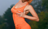 Met Art Violla A Razao by Matiss Wearing a body-hugging dress that shows off her sexy curves and sexy orange pumps, Violla A turns an outdoor shoot to a naughty striptease.
