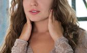 Met Art Arina G Sangita by Alex Iskan 46838 Arina G plays around naked under her see through sweater.
