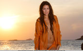 Met Art Gracy Taylor Taronja by Luca Helios 46958 Gracy Taylor strips naked in the beautiful sunset on the beach.
