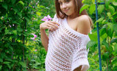 Met Art Taissia A Arekesi by Rylsky 47036 Like a bright and delicate flower in full bloom, Taissia A's youthful beauty stands out in this garden shoot with Rylsky.
