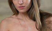 Met Art Tayra A Presenting Tayra by Alex Iskan 47041 Tayra A is a pretty blonde debutante with sparkling blue eyes who loves dressing up then stripping off her clothes in front of the camera.
