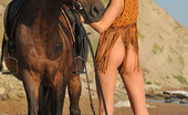 Met Art Suzanna A Atti by Goncharov 47384 Suzanna A horse-back rides naked on the beach
