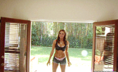  53891 Brunette Tori Black poses outdoors while stripping for this photo shoot
