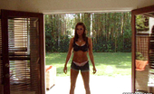  53891 Brunette Tori Black poses outdoors while stripping for this photo shoot
