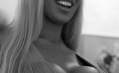  Mary Carey Hot busty blonde pornstar, Mary Carey, is a vision stripping down to the nude and revealing her sexy body in this black and white photo set.
