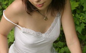  66408 Teen in a white dress
