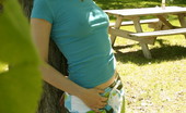  66414 Sexy teen poses outdoors
