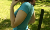  66414 Sexy teen poses outdoors
