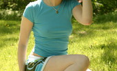  66414 Sexy teen poses outdoors
