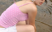  66444 Sexy teen with pink cap

