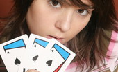  66452 Sexy teen model plays cards
