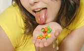  66457 Cute teen eats candy naked
