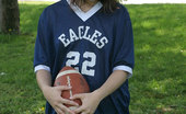  66467 Sexy teen model in football jersey
