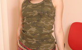  66471 Cute teen posing in camo shirt
